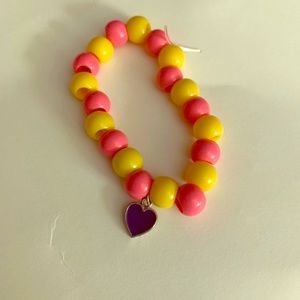 Pink and yellow bracelet with Purple Heart charm